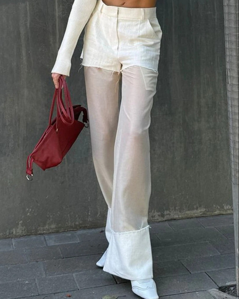 Ashore_two_piece_white_suit_featured_a_short_white_blazer_top_and_white_sheer_pant-4