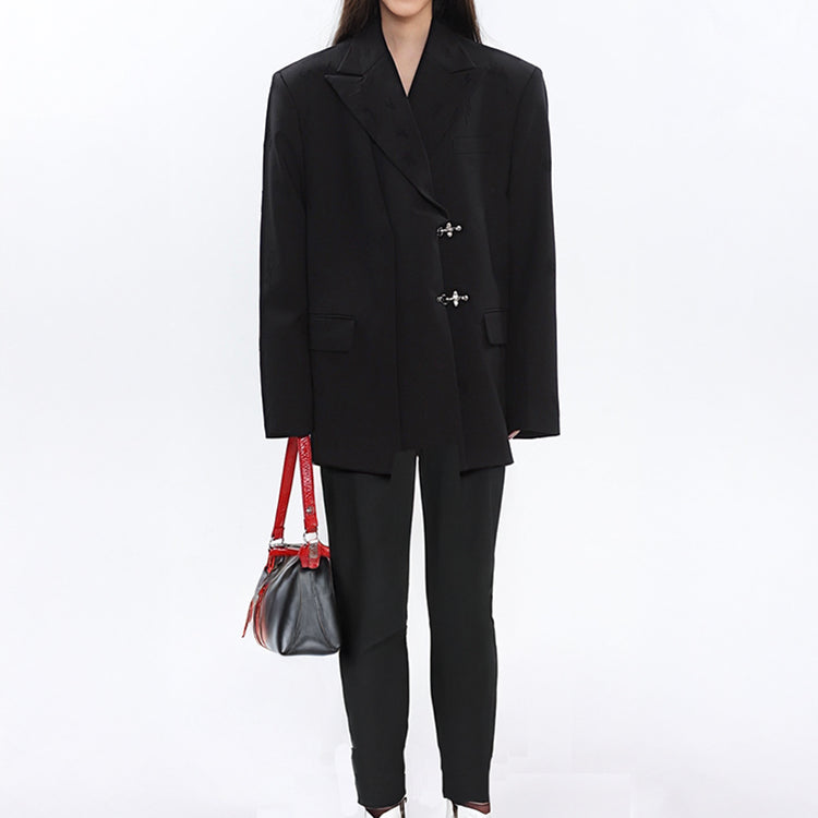 Loose_fit_wider_shoulder_women_unsymmetrical_placket_blazer_wearing_w-1ith_wide_leg_jean