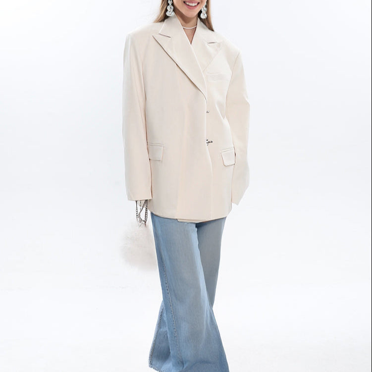 Loose_fit_wider_shoulder_women_unsymmetrical_placket_blazer_wearing_with_wide_leg_jean