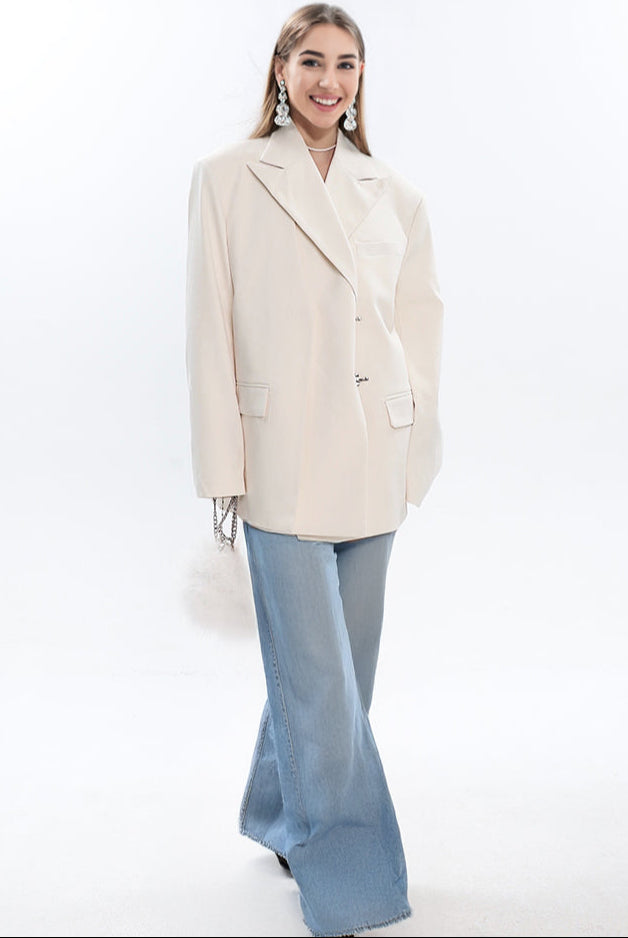 Loose_fit_wider_shoulder_women_unsymmetrical_placket_blazer_wearing_with_wide_leg_jean